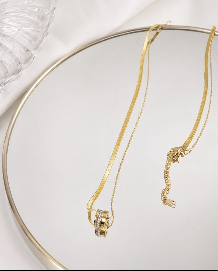 Gold double layer herringbone pendant